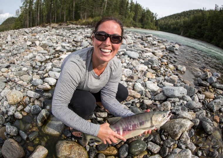 Molly with her fish on BLANK RIVER. Photo by Kevan Dee. 