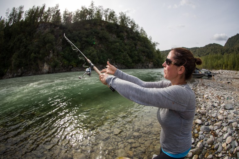Molly fishing on the BLANK river. Photo by Kevan Dee. 