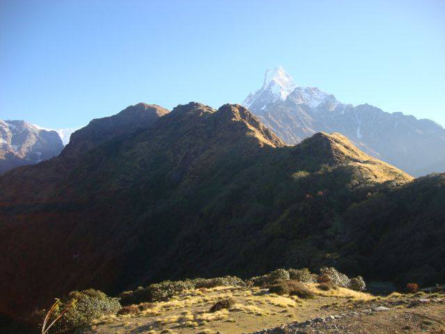 High Camp in the Annapurna Region of Nepal. Machupuchara sits in the distance. Monika trekked with a Nepali guide all the way from the village of Nayapul then made her way to High Camp and then to Machupuchara. Photo courtesy of Monika Fleming.