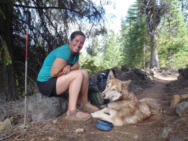 Molly and Scout, Molly wears Chacos to help alleviate blisters while hiking the Pacific Crest Trail.. Photo courtesy of Molly Liston.
